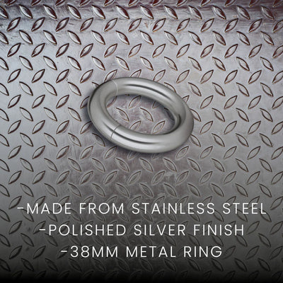 Polished silver stainless steel magnetic ring with 38mm diameter on textured metal background.
