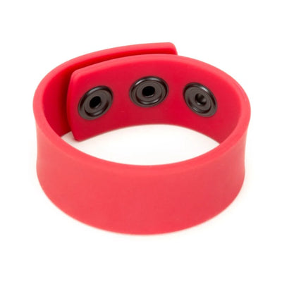 Red silicone adjustable strap with black snap closures designed for a comfortable fit.