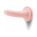 Realistic 6.5-inch soft silicone dildo with lifelike veins and suction cup base for hands-free use and harness compatibility.