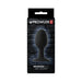 Prowler Xlarge weighted black butt plug in sleek packaging with brick wall background and product details.