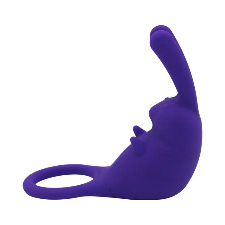 Purple silicone cock ring with dual-tip rabbit-shaped bullet vibrator for targeted external stimulation.