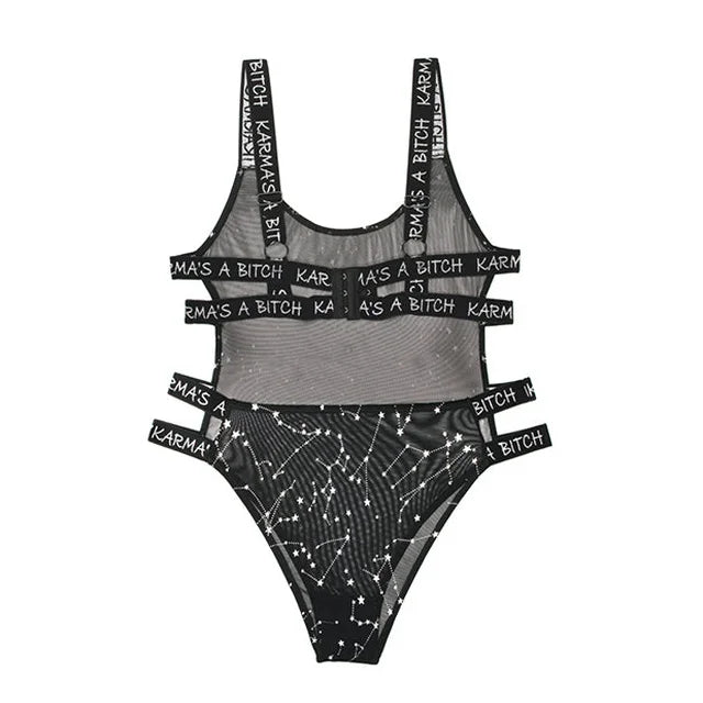 Black metallic mesh bodysuit with constellation print and bold "Karma's A Bitch" strap details.