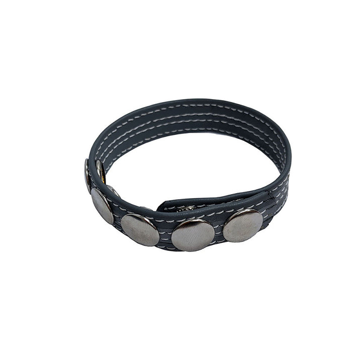 Black leather adjustable ring with five silver snap buttons and white stitching detail