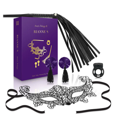 Rianne S Ana's Trilogy Kit 3 with black lace mask, black faux leather whip, purple sequin pasties, and black vibrating ring with purple box.