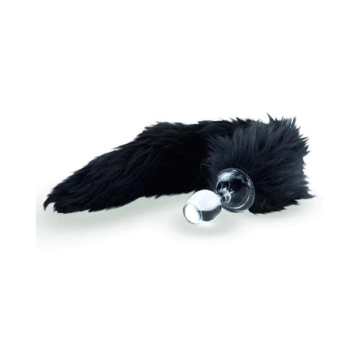 Black faux fur tail attached to a clear glass plug with a flared base for comfort and safety.