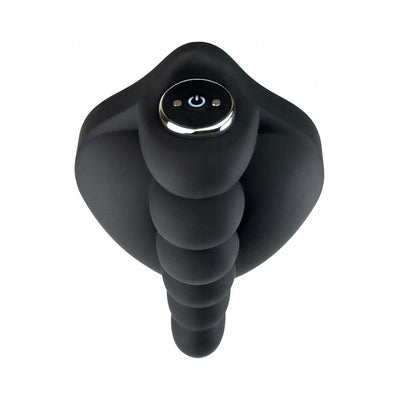 Black silicone Honeybunch grind pad with contoured nubs and built-in power button for customizable vibration.