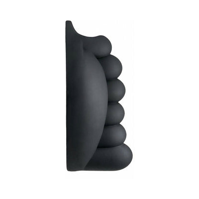 Black silicone Honeybunch grind pad with contoured rounded nubs for enhanced stimulation.