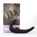 Black silicone Wet for Her Four More strapless strap-on with packaging showing product details and care instructions.