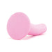 Pink medium-sized silicone toy with a smooth, curved design and a wide base for stability.