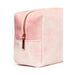 Soft pink velvet rectangular storage case with rose gold zipper and small front pocket detail.