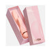 Pink VUSH Muse Rabbit Vibrator with control buttons in matching pink box with rose gold accents.