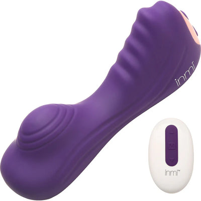 Purple textured silicone vibrator with ridges and remote control for customizable vibration settings.
