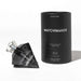 Eye of Love Matchmaker Black Diamond pheromone perfume in a black diamond-shaped bottle with matching black cylindrical packaging.