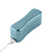 Metallic blue USB charging case for Femme Funn Booster Bullet massager with white charging cable connected.