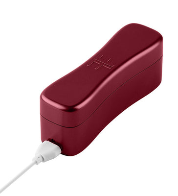 Compact maroon USB charging case for Femme Funn Booster Bullet massager with sleek curved design.
