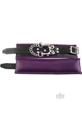 Purple padded leather wrist cuff with adjustable black buckle strap and detachable silver chain hook.