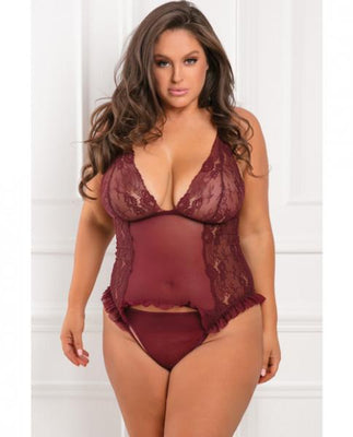 Plus size model wearing burgundy lace and mesh ruffle teddy lingerie set with matching panties.
