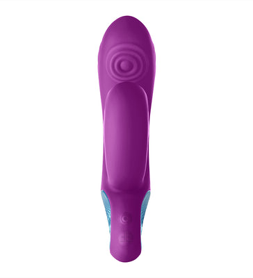 Purple silicone Femme Funn Cora Thumping Rabbit vibrator with ergonomic shape and textured detail on top.