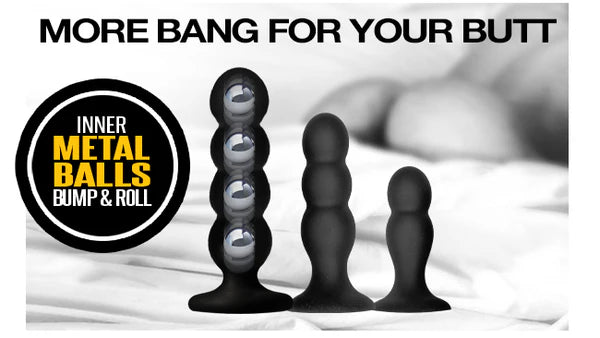 Set of three black graduated butt plugs with smooth finish and inner metal balls for bouncing sensations, featuring suction cup bases.