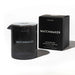 Eye of Love Matchmaker pheromone massage candle in black glass jar with matching black box packaging.