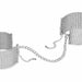 Silver metal mesh handcuff bracelets connected by a detachable chain with adjustable clasps.