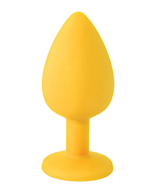Yellow silicone butt plug with tapered shape and flared base for safe use.