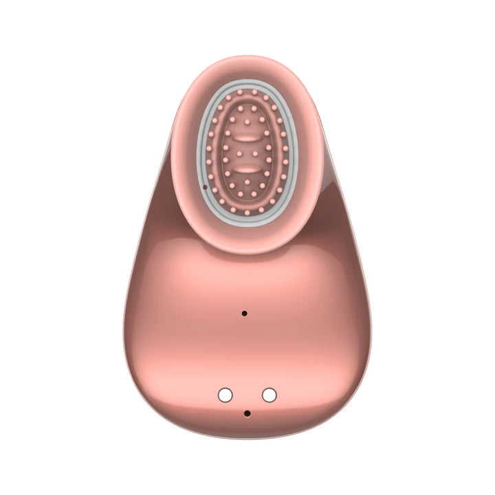 Rose gold hands-free suction vibrator with textured silicone cup and smooth ergonomic body design.