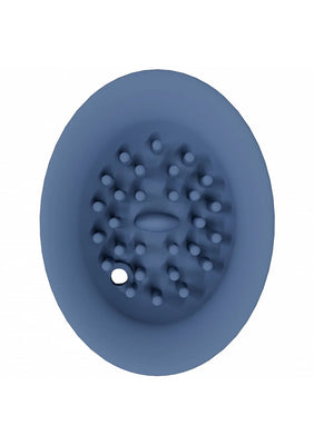 Close-up of the blue silicone textured surface with raised nodules of the Twitch 3 rechargeable vibrator and suction device.