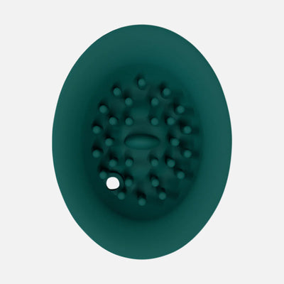 Top view of a teal silicone attachment with textured nodules for the Twitch 3 rechargeable vibrator and suction device.