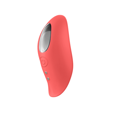 Coral-colored sleek remote-controlled panty vibrator with power button and metallic accent.