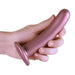 Hand holding a smooth, rose gold 6-inch silicone G-spot dildo with a strong suction cup base.