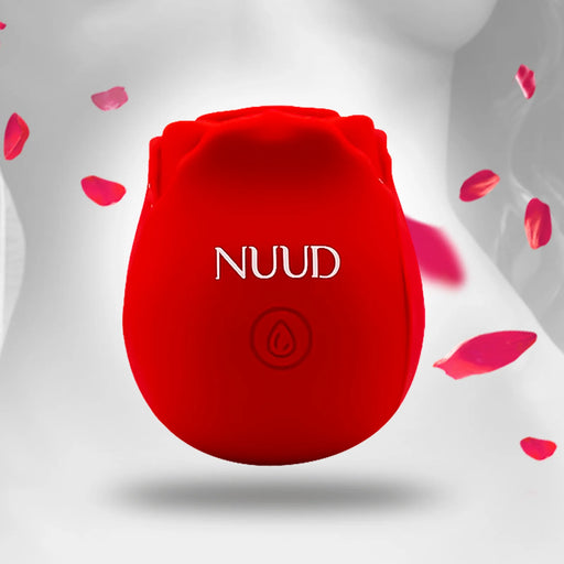 Red rose-shaped pulsing vibrator with NUUD branding and floating rose petals on a soft gray background.