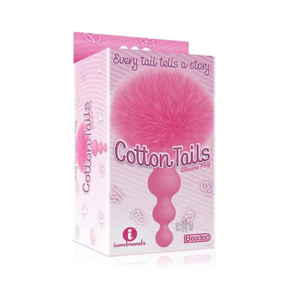 Packaging of The 9's Cottontails Silicone Bunny Tail Butt Plug featuring a pink beaded design with a fluffy tail.