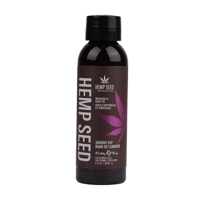 Bottle of Earthly Body Hemp Seed Massage and Body Oil with purple leaf design and black cap, 2 fl oz size.