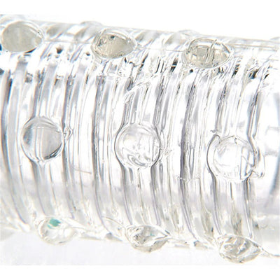 Close-up of clear textured sleeve with raised bumps and ridges for enhanced sensation.