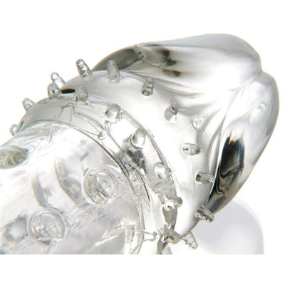 Clear 2-inch penis extender sleeve with textured nubs and a flexible, contoured tip for enhanced sensation.