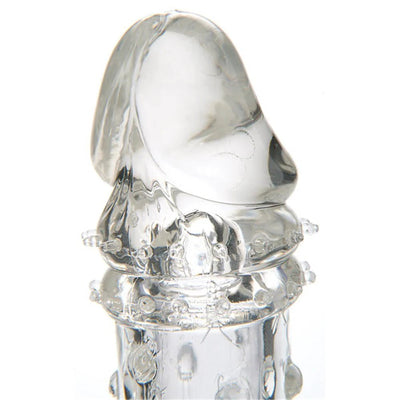 Clear 2-inch penis extender sleeve with textured rings and nodules for added stimulation.