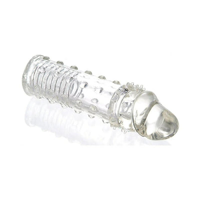 Clear textured 2-inch penis extender sleeve with raised nodules and flexible design for enhanced sensation.