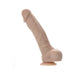 Realistic flesh-toned silicone dildo with textured veins and suction cup base for hands-free use.