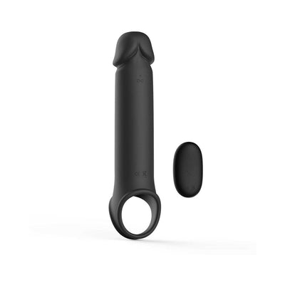 Black silicone vibrating extension sleeve with a ball strap base and a small oval remote control.