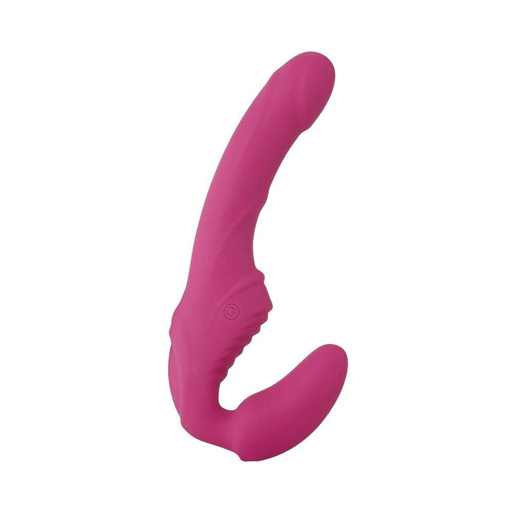 Pink silicone strapless strap-on with curved shaft and textured base for dual stimulation, designed for hands-free use.