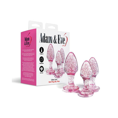 Set of three pink glitter acrylic butt plugs in small, medium, and large sizes with gem-shaped bases next to Adam & Eve packaging.