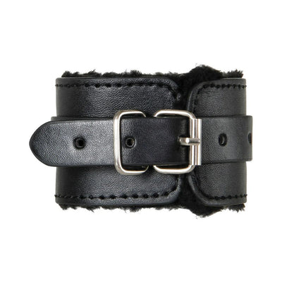 Black faux leather cuff with soft black faux fur lining and silver buckle closure, part of a restraint kit.