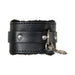 Black faux leather cuff with soft fur lining and metal clasp for adjustable restraint play.
