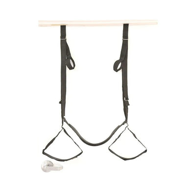 Black adjustable door swing with padded seat and stirrups hanging over a white door with silver handle.