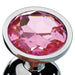 Medium-sized polished metal anal plug with a faceted pink gem at the base for a stylish finish.