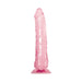 Pink translucent realistic dildo with textured veins and suction cup base standing upright on white background.