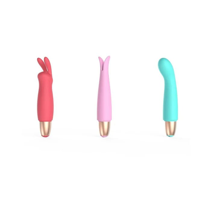 Three colorful silicone sleeves for a bullet vibrator in red, pink, and blue with gold bases on a white background.