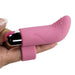 Hand holding a pink silicone finger vibrator with textured tip and removable bullet vibrator insert.