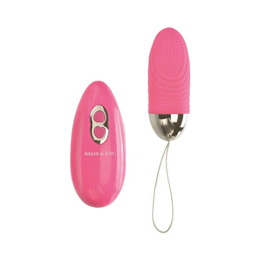 Pink Adam & Eve Turn Me On rechargeable love bullet with textured tip and matching remote control on white background.